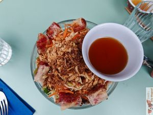 Homemade brioche bread, mint and celery leaves, coleslaw, roasted eggplant, tomato and dill, served with fries. at Primeur Cantine in Paris
