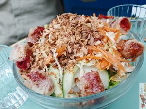 Homemade brioche bread, mint and celery leaves, coleslaw, roasted eggplant, tomato and dill, served with fries. at Primeur Cantine in Paris