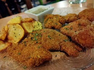 Escalopines a la asturiana at El Chigre de Manjatan in Majadahonda