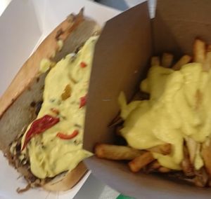 Cheese fries & Wk Philly (Philly cheesesteak).  at Wiz Kid in Philadelphia