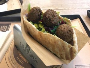 Vegan falafel pita with hummus and grilled vegetables. at Baba Green in Dusseldorf
