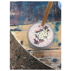 Cacao, coffee, almond milk, vanilla protein, banana smoothie. at HAH Lorne Beach in Lorne