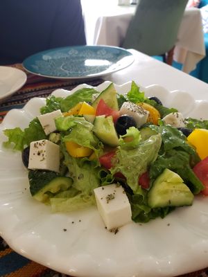 Greek salad with homemade vegan feta at Veggie House in Astana