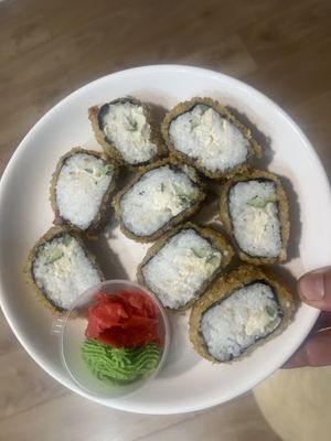 California rolls tempura style- tofu cheese, cucumber, lettuce, vegan cream cheese, nori sheet, rice in mitsuken sauce, and GF batter  at Veggie House in Astana