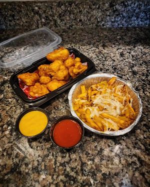 Fried Cauliflower with Un-Cheese and Vegan Cheese Fries with Marinara at Grandpa Mac - Coastal Hwy in Rehoboth Beach