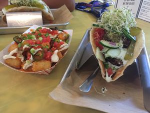 Loaded Tator Tots and Falafel Sandwhich at Curia on the Drag Food Truck in Gainesville