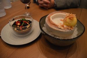 Chocolate terrarium with peanut butter cream, and coconut chia pudding with passion fruit sorbet (served inside a young Thai coconut).  at PLANTA - Yorkville in Toronto