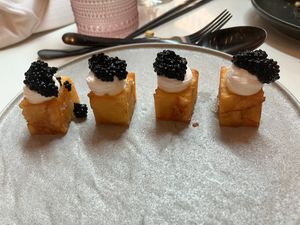 1,000 LAYER CRISPY POTATOES

caviar, sour cream, chives at PLANTA - Yorkville in Toronto