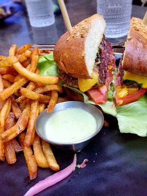 Queso Burger + fries  at PLANTA - Yorkville in Toronto