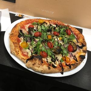 Vegan Pizza, with a base of personnal vegan cheese. at Pizza Julia in Paris