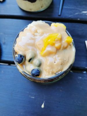Porridge with peanut butter, Mango, blueberries, Açaí at Superfood Deli - Mariahilfer in Vienna