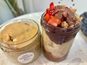 Porridge with added pb & acai porridge with lots of toppings at Superfood Deli - Mariahilfer in Vienna