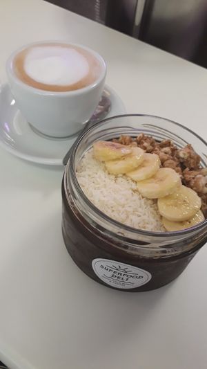 Capuccino (with rice milk), Brazilian açai bowl at Superfood Deli - Mariahilfer in Vienna