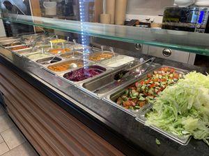 Salad bar to choose toppings   at KartoffelKonig in Munich