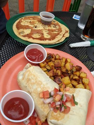 Vegan breakfast burrito, hash browns and vegan banana pancakes! at The Friendly Toast in Boston