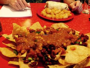 vegan nachos with vegan chili and delicious melted vegan cheese hidden underneath! at The Friendly Toast in Boston