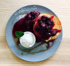 Banana pancakes with berries and vanilla ice-cream at Wombat Cafe & Store in Dromana