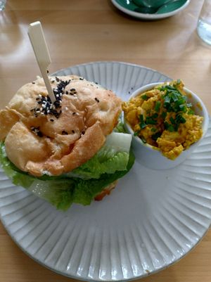 Plant based bacon bun and side order of scrambled tofu at Wombat Cafe & Store in Dromana