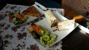 Vegetarian quiche with salad and vegan Döner wrap at 37 grad Kaffeebar Landegeschäft in Lindau