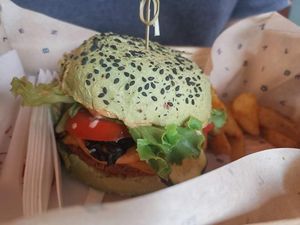 Vegan burger with oven baked potato at Flower Burger in Rome