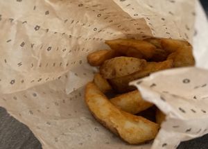 Spicy potato wedges  at Flower Burger in Rome