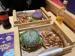 Purple flowerburger and green jungle bbq. Borg with patatas buenas.  at Flower Burger in Rome