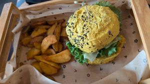 Spicy cece bugger with fries at Flower Burger in Rome