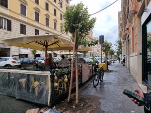 Outdoor seating at Flower Burger in Rome