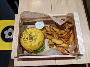 Spicy burger with fries and vegan mayo at Flower Burger in Rome