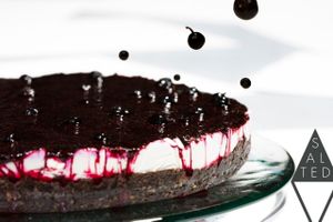 Raw vegan coconut cake with blueberry puree at Salted Cafe in Sofia