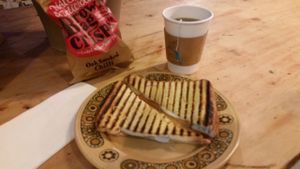 Yummy vegan lunch! A vegan 'ham' and 'cheese' grilled cheese, with vegan crisps and a yummy mint tea! And the coffee is amazing - been drinking it for the past year!  at Sham City Roasters in Hastings