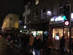 Busy outside after the Arsenal match  at Cookies and Scream - Drayton Park in North London