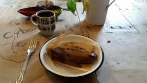 Vegan chocolate tamale with a cup of black coffee. at Chia Fonda Vegana in Guadalajara