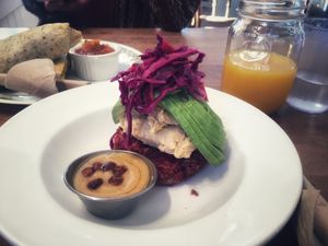 avocado and  hummus with a limited - time beet root patty toast. at The Gumboot Cafe in Roberts Creek