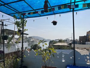 Roof top seating and view   at Yummy Yoga Cafe in Udaipur