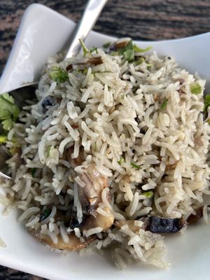 Mushroom rice  at Yummy Yoga Cafe in Udaipur