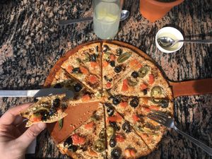 Delicious vegan pizza with cashew ‘cheese’! at Yummy Yoga Cafe in Udaipur