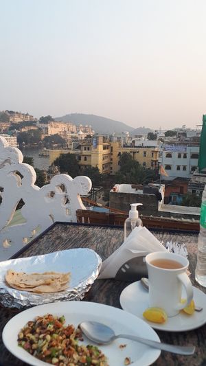 View of the lake Udaipur at Yummy Yoga Cafe in Udaipur