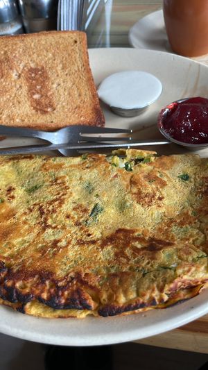 Chickpea omelette and toast with cashew cream and jam  at TATTV Cafe in Rishikesh