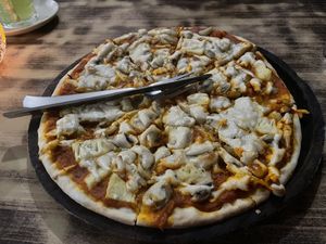Milano pizza + mushrooms and vegan cheese…you can ask for any dish to be made vegan   at TATTV Cafe in Rishikesh