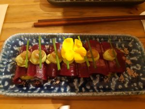 Rawvioli met rode biet gevuld met bieslook kaas en gekarameliseerde uien at Hearth  in Amsterdam