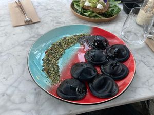 Black charcoal ravioli at Hearth  in Amsterdam
