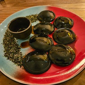 Black charcoal ravioli at Hearth  in Amsterdam