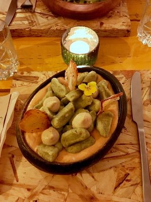 Brocoli gnocchi with dried tomato sauce and vegan aïoli sauce at Hearth  in Amsterdam