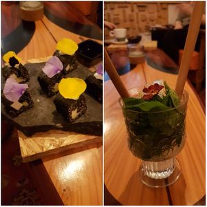 Flower petals adorn the dishes. at Hearth  in Amsterdam