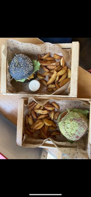 Black and Green burgers with side of potatoes  at Flower Burger - Porta Genova in Milan