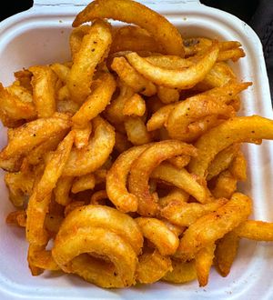 Curly fries, nice and crispy  at iKraveit Foods in Astoria