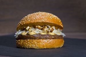 The Salzburger - with sauerkraut & mustard. The patty ist made of lentils at Vleischpflanzerl in Salzburg