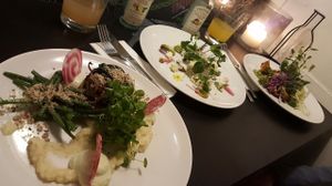 Baked celeriac dish in the front at The Organic LAB in Copenhagen