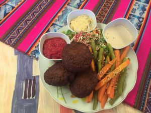 Falafel with hummus, tahine and tomato sauce. at Hostal Joshua in Copacabana